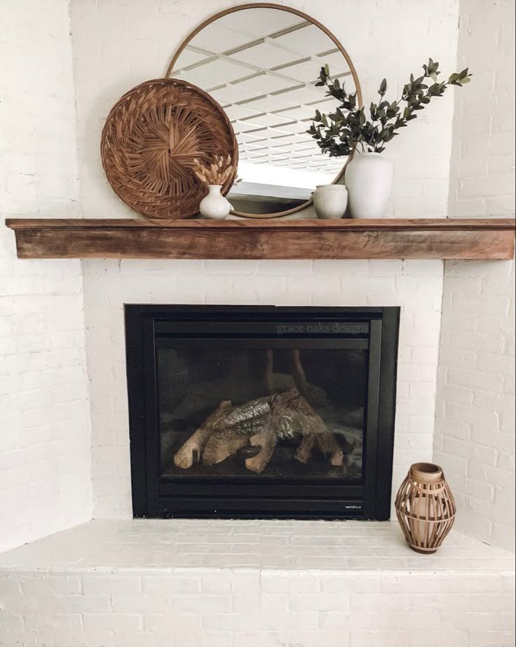 Fireplace with an awkwardly small piece of art that doesn't fill the wall