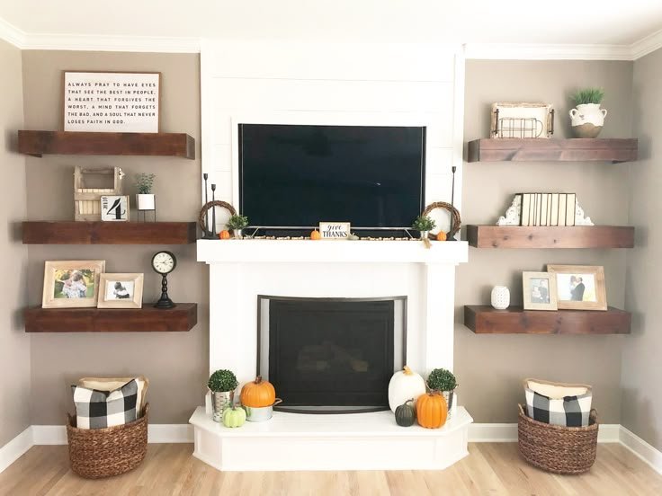 Low-profile TV mounted above a fireplace with balanced proportions