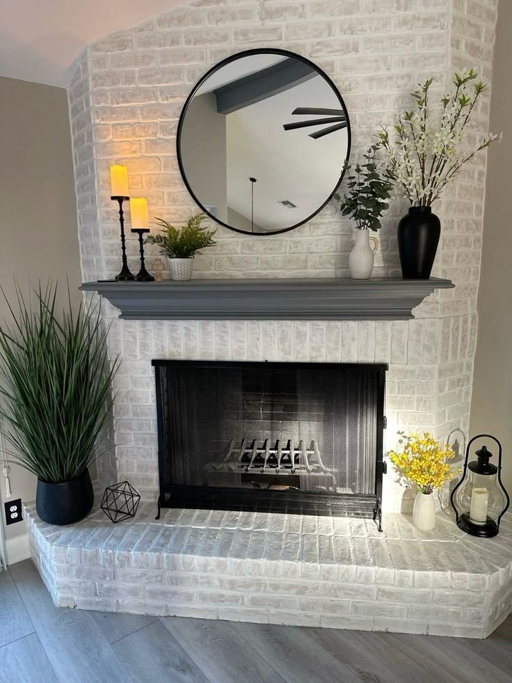Floor-to-ceiling stone feature wall surrounding a fireplace