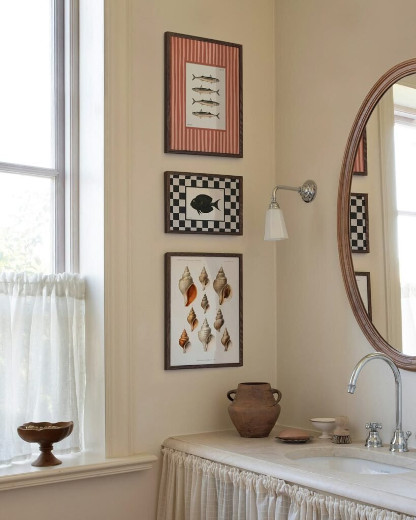 Powder room featuring bold art in a compact space