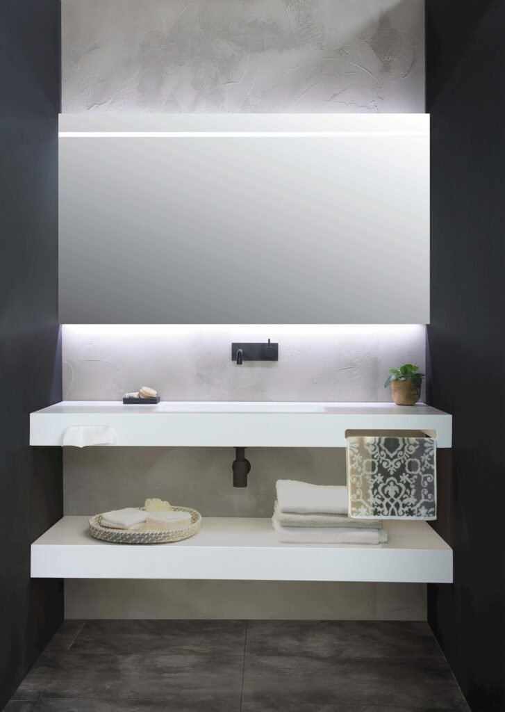 Thoughtful accessories extending the mirror cabinet's visual presence