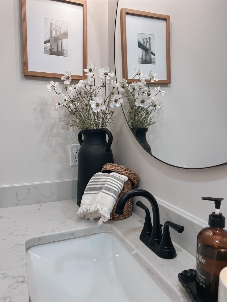 Matching sink accessories styled together on a bathroom counter
