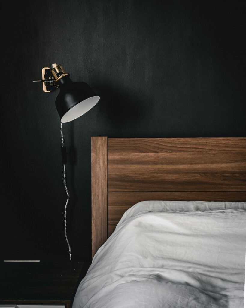 Rich textures adding depth and interest to a black bedroom