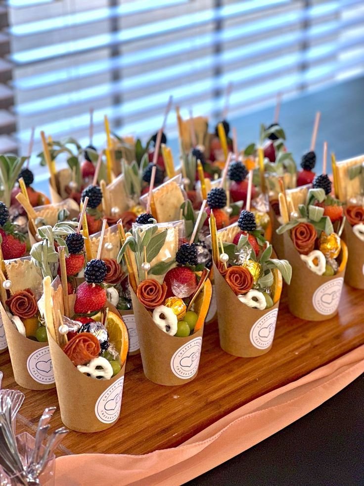 Sweet and savory charcuterie cup with sharp cheese, fresh fruit and chocolate