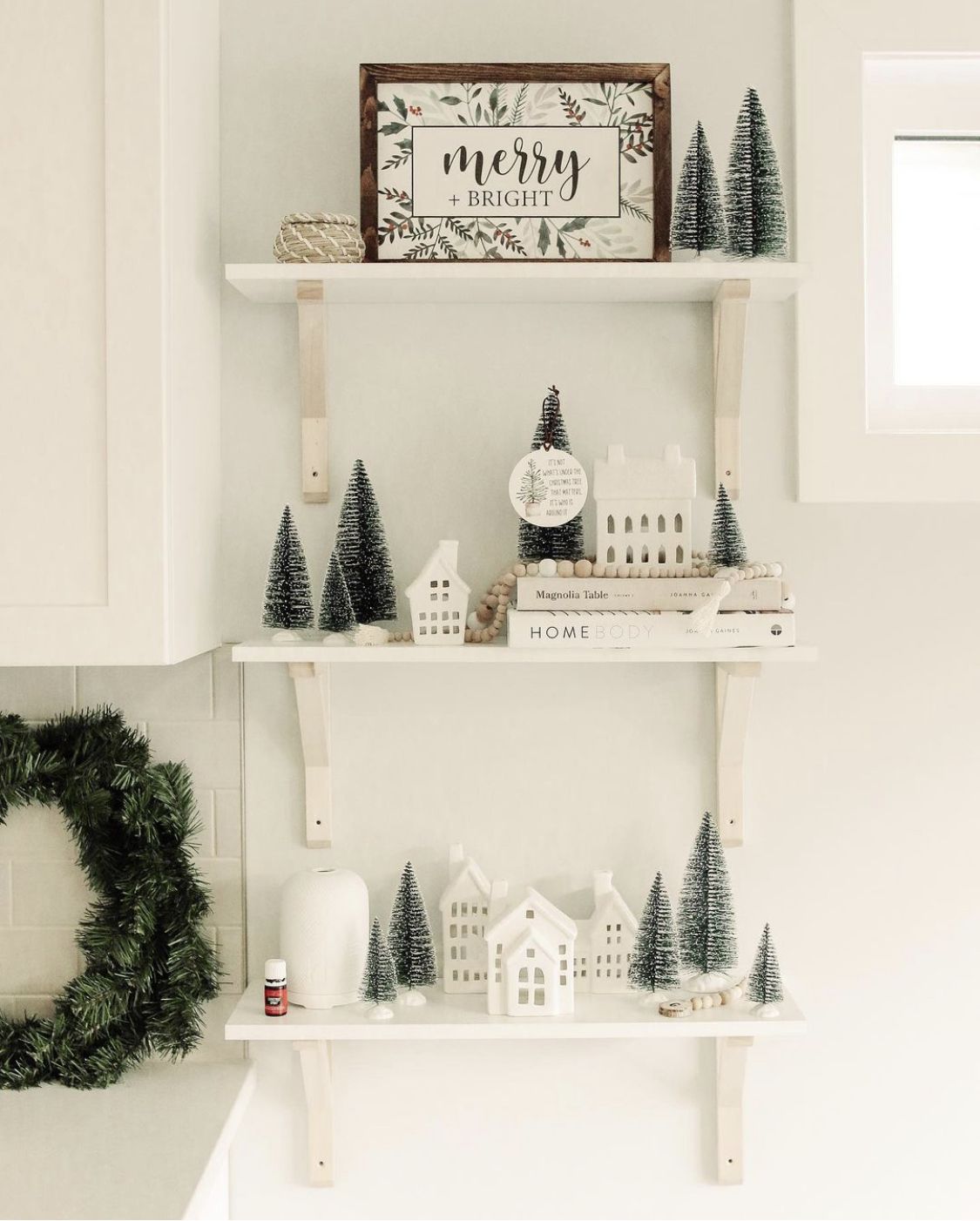 Powder room shelf with a Merry and Bright Christmas sign