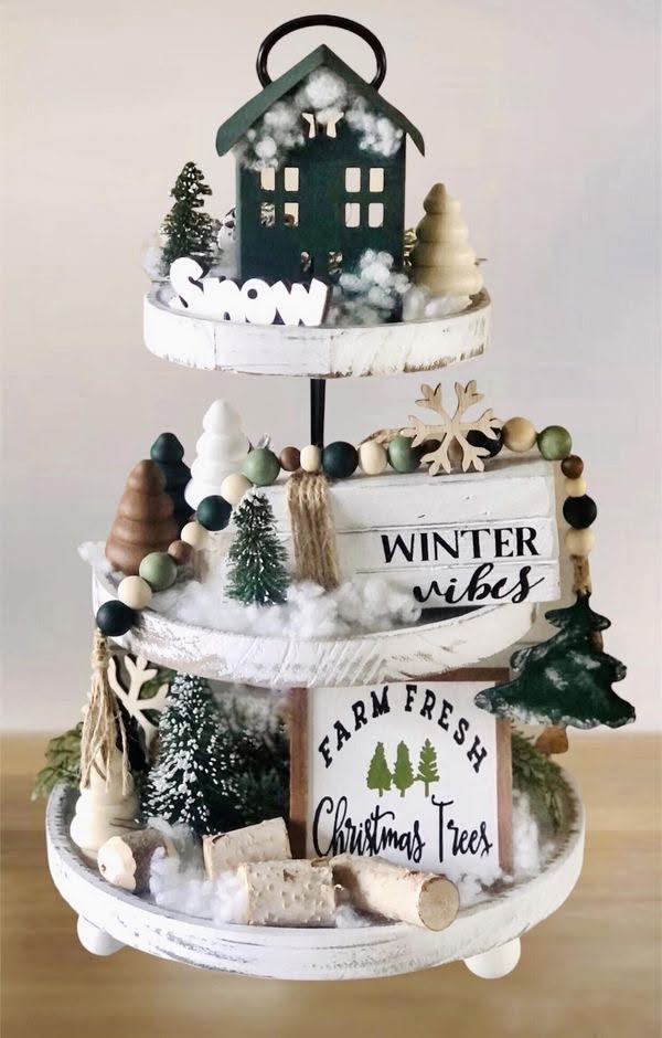 Three-tier whitewashed tray with a snowy house topper and a Winter Vibes sign