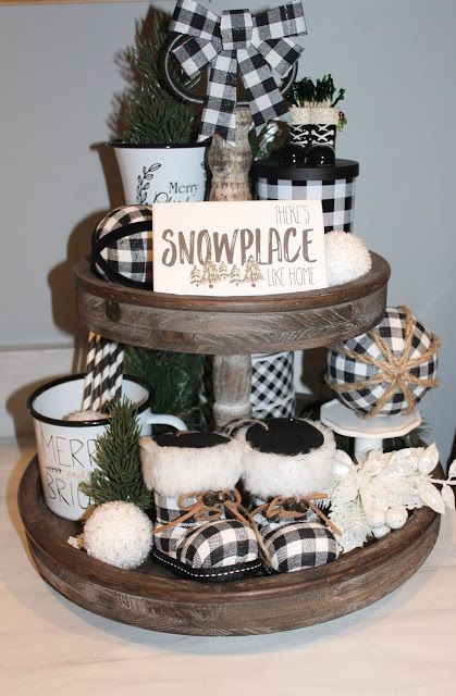 Tiered tray with an Oh Holy Night sign and a buffalo plaid gift box