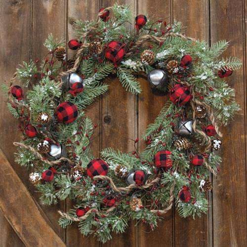 Pine wreath with buffalo plaid ribbon and gold jingle bells