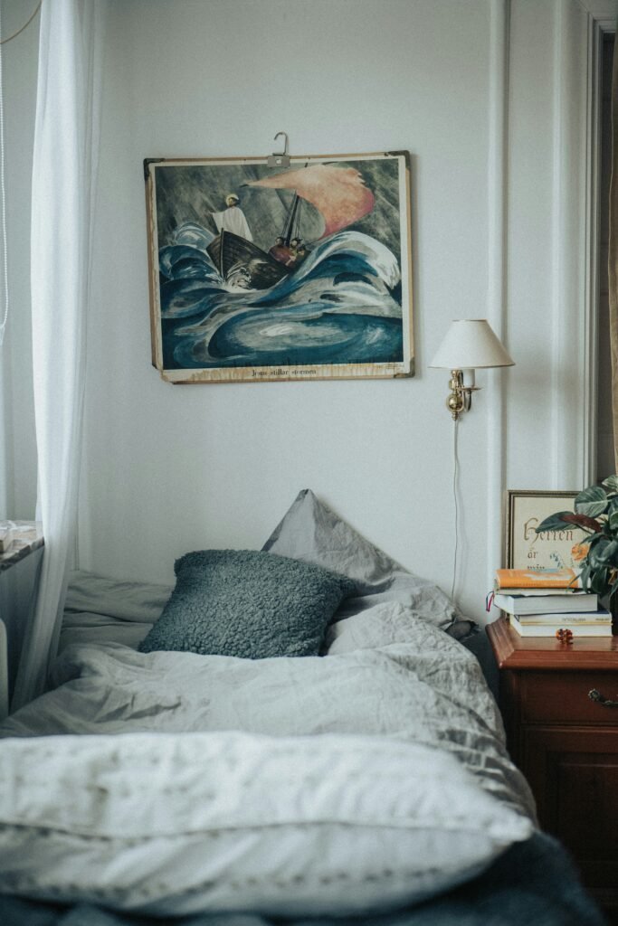 Statement art piece adding character to a coastal bedroom