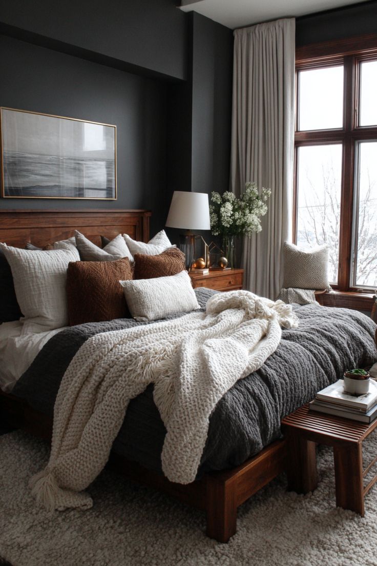 Dark and moody bedroom with wood trim