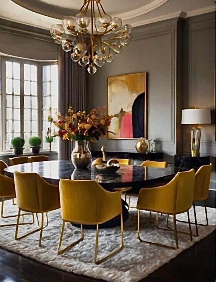 Dining room with a strategic pop of color through chairs and decor