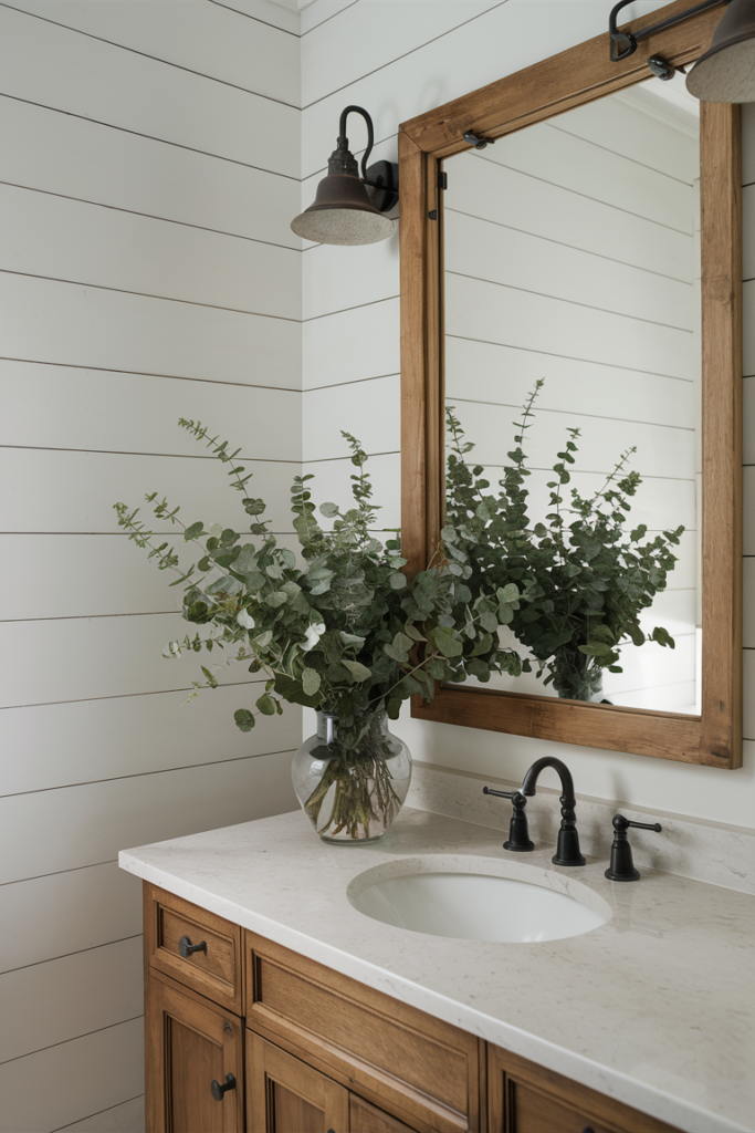 Shiplap accent wall in a serene farmhouse bathroom