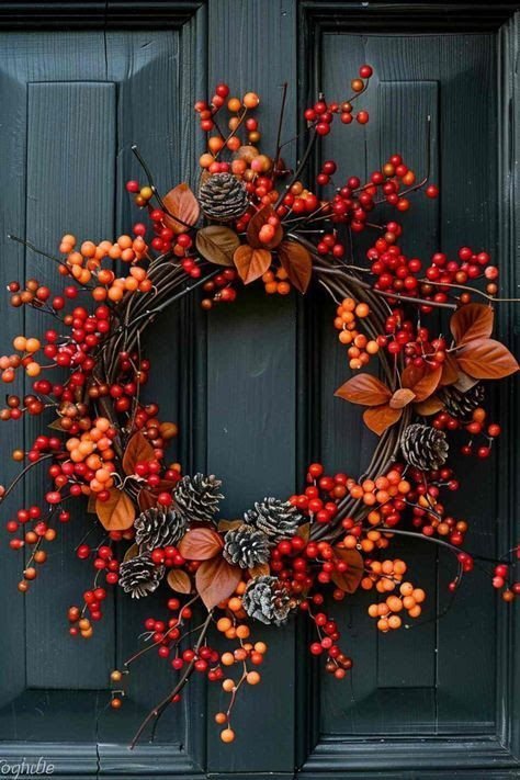 A fall berry wreath bringing deep color accents to a natural base