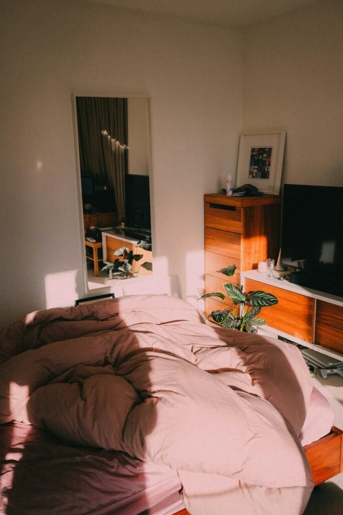 Layered bedding creating maximum comfort in a guest room