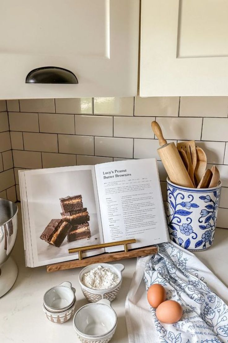 Cookbooks stacked as part of kitchen counter decor