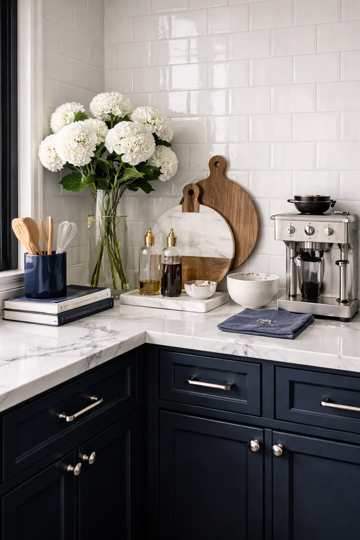 Navy blue kitchen counter decor with styled appliances