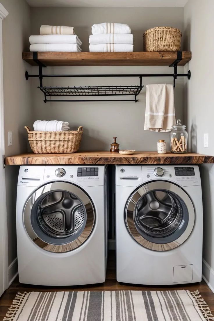 Butcher block countertop folding station above a washer and dryer with a wire drying rack below the shelf