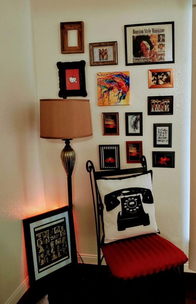 Mini gallery wall adding a personal touch to the corner