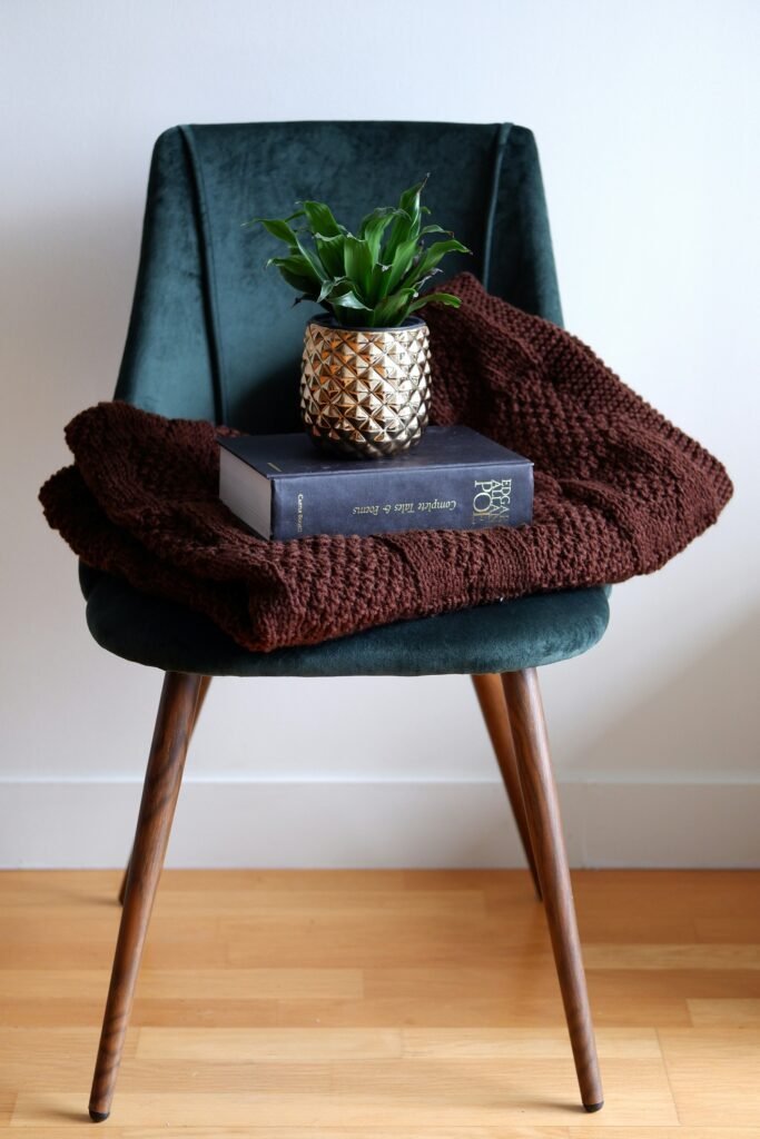 Cozy knit decor pieces styled throughout a winter home
