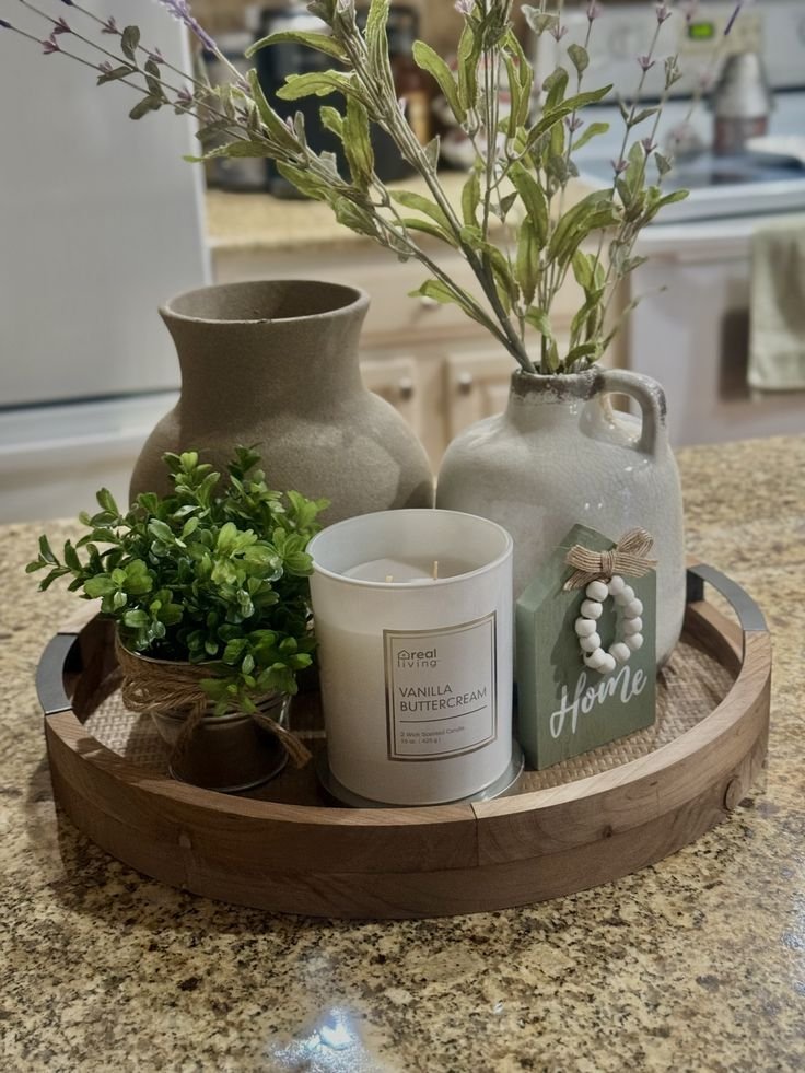 Low-profile round tray centerpiece styled on an everyday dining table