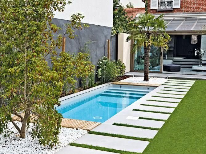 Vertical garden framing a small backyard pool