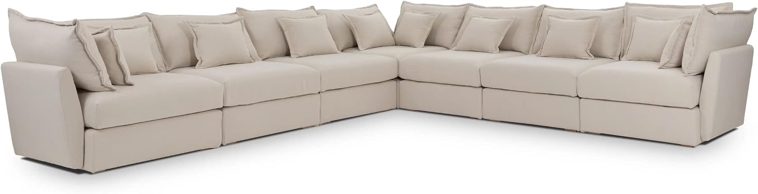 Large cream linen L-shaped sectional sofa with channel-tufted cushions