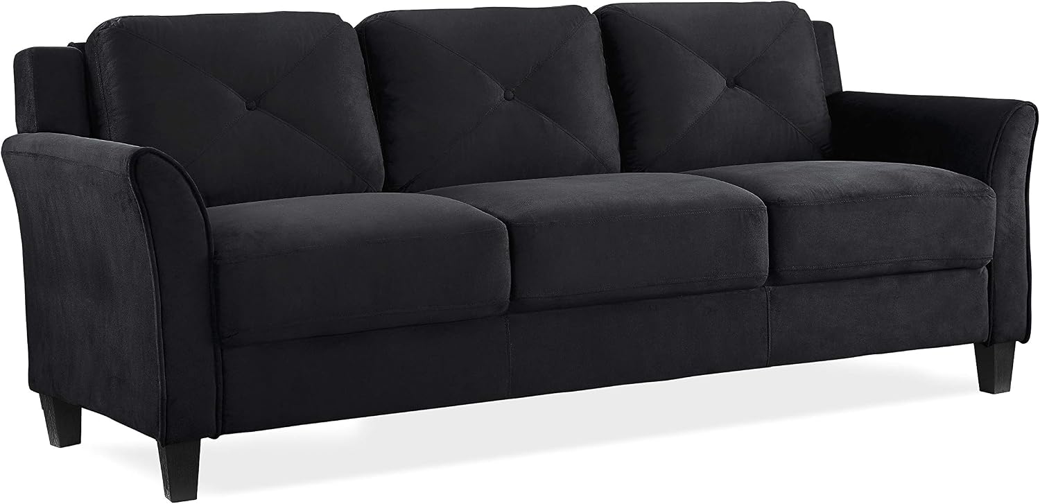 Black sofa with clean tapered lines and structured arms