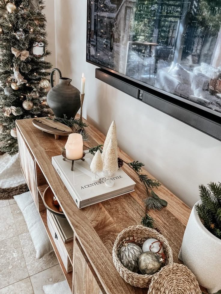 Warm wood accents balancing a modern TV stand setup