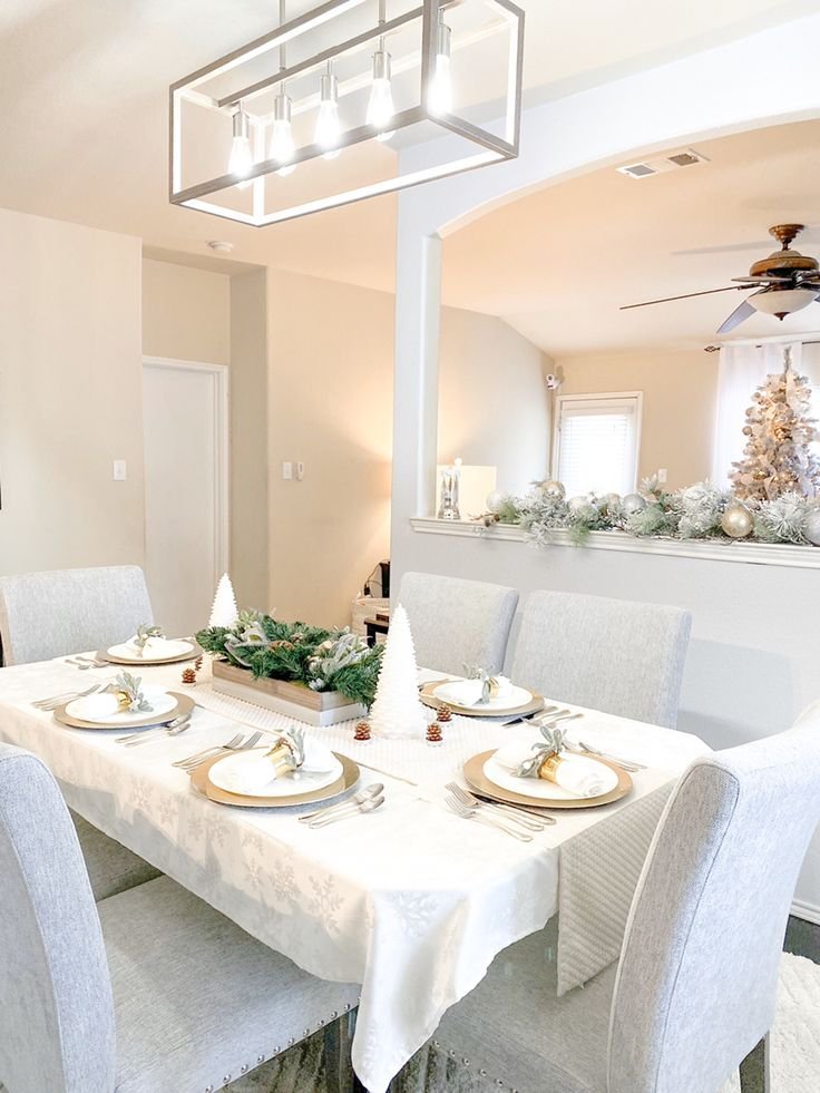 Winter white tablescape layered with linen and ceramic textures